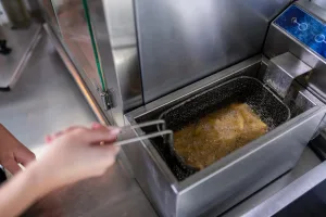 Discover how induction fryers can reduce energy costs and improve efficiency in professional kitchens. Optimize your frying today.