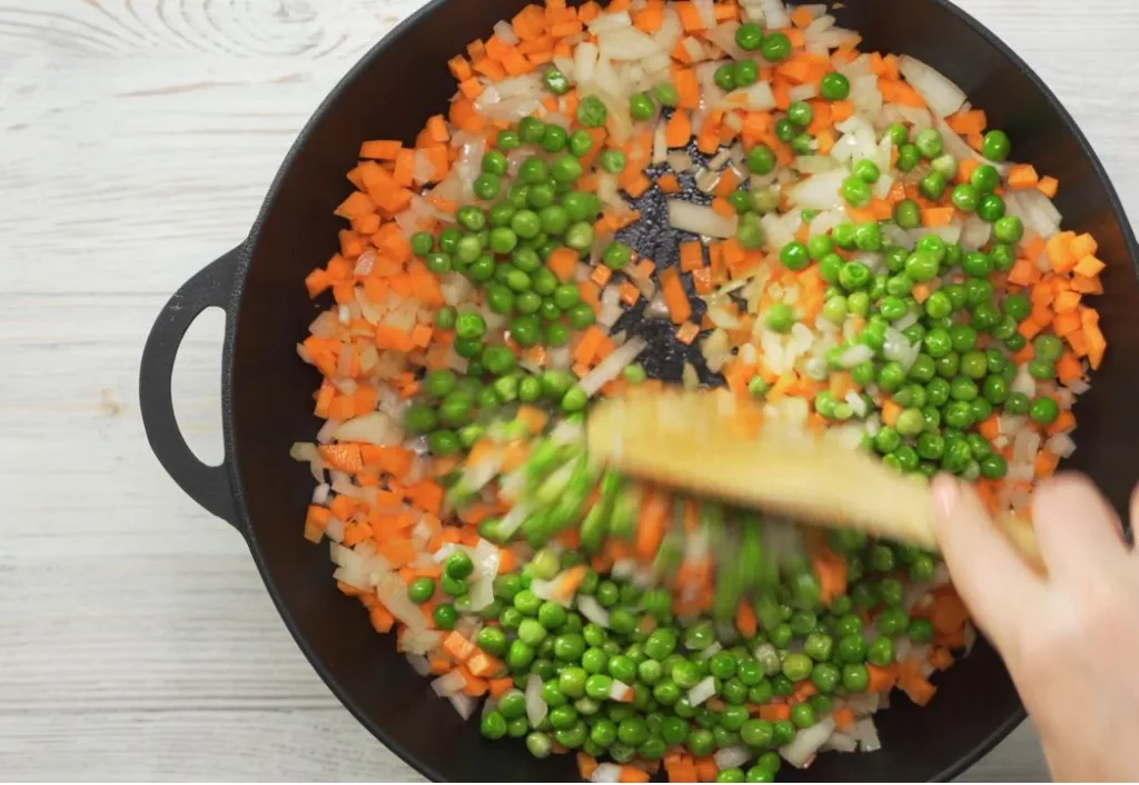 Warm Up the Oil and Sauté the Veggies